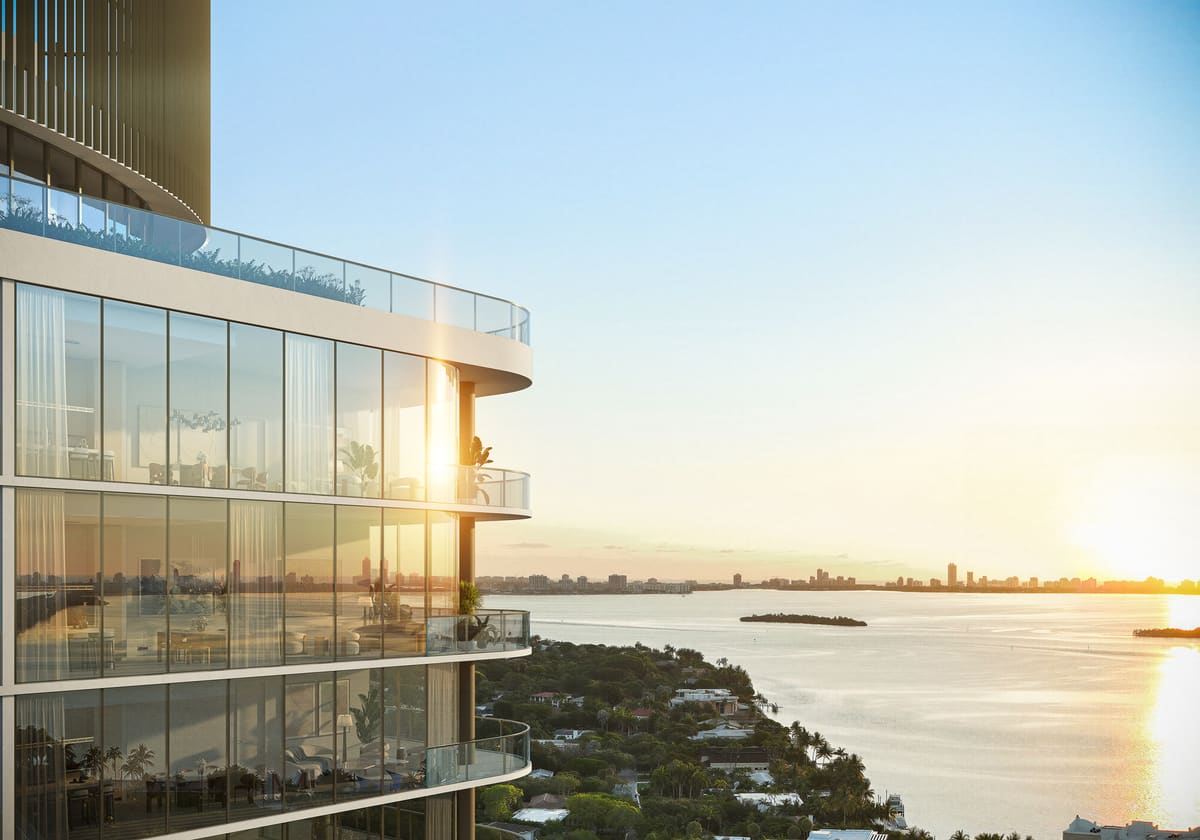 Sunset over Biscayne Bay seen from the curved glass façade of Kempinski Residences Miami Design District