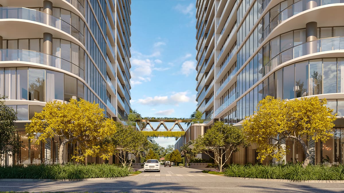 The private landscaped passage between the North and South towers, with the fourth-floor amenity bridge above