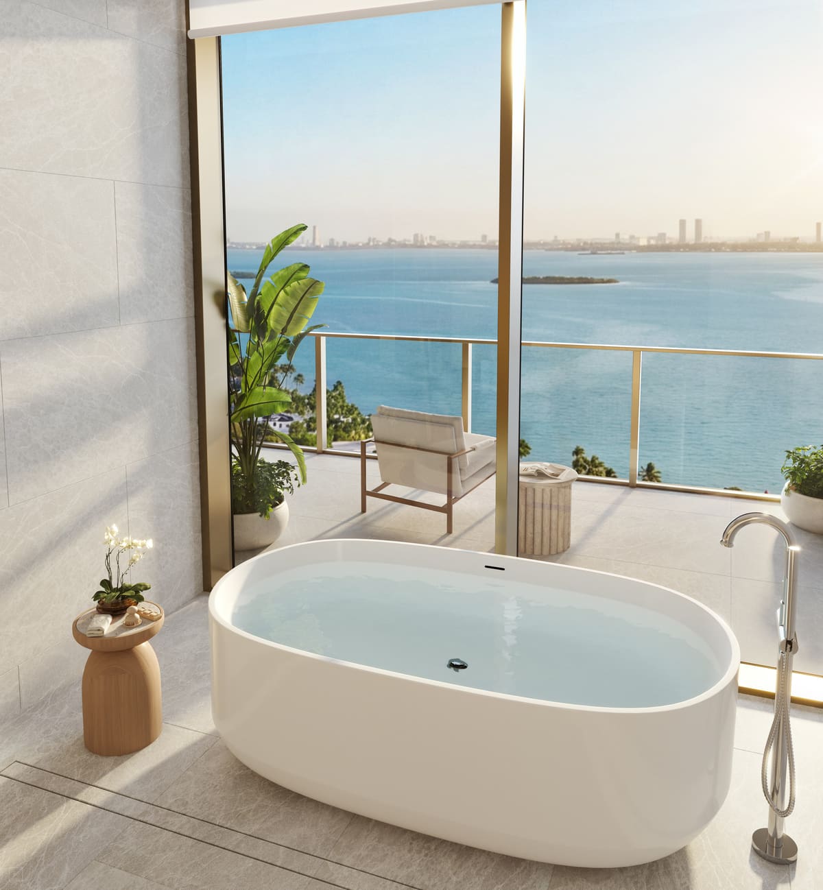 A spa-inspired primary bathroom with freestanding tub and bay views