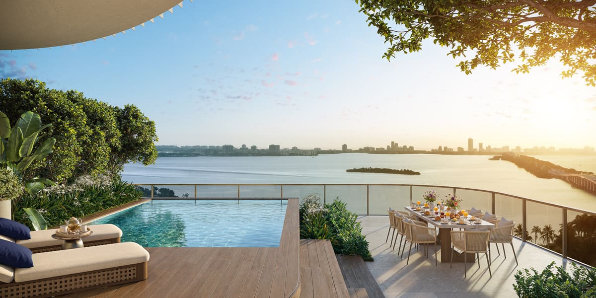A private rooftop terrace with plunge pool and outdoor dining overlooking Biscayne Bay