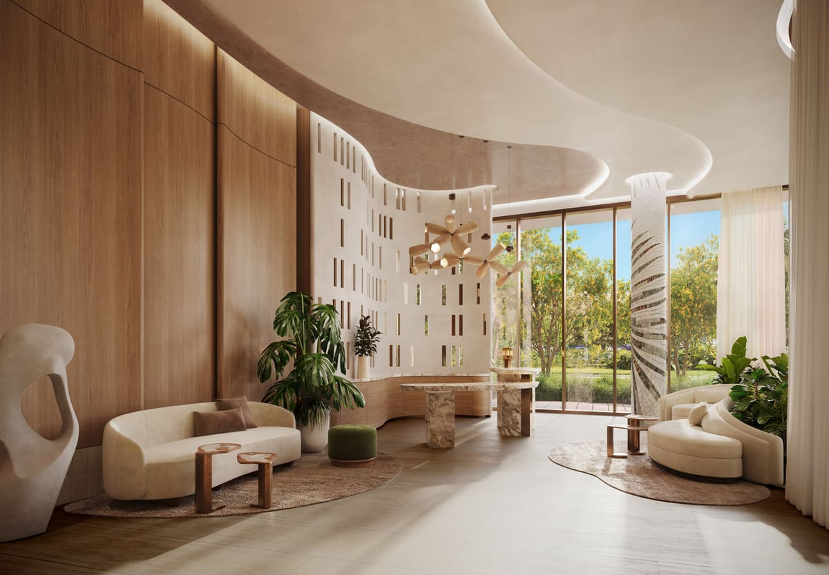 The South Tower residential lobby with sculptural seating and full-height glazing to the gardens