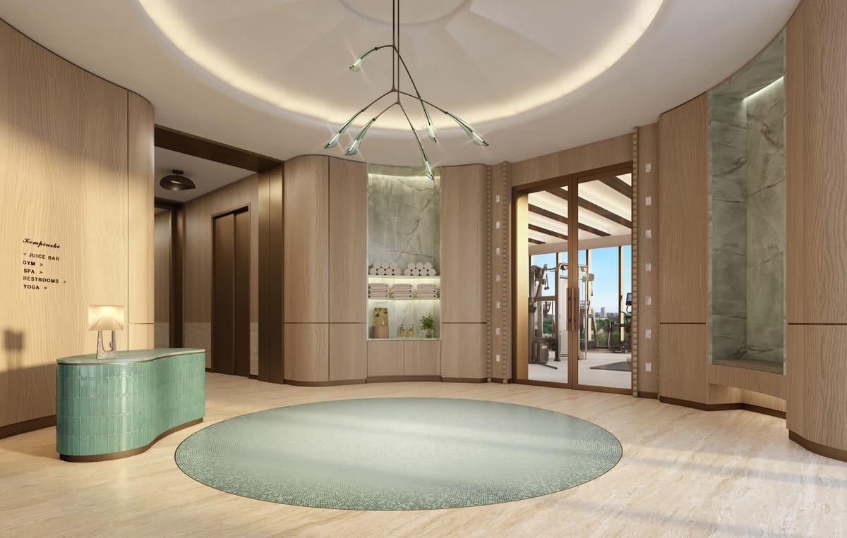 The spa reception at Kempinski Residences Miami Design District, finished in pale timber and stone